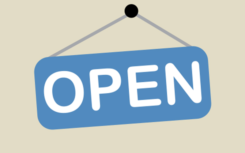 The Open Library logo; a blue sign hanging on a wall that says "Open."